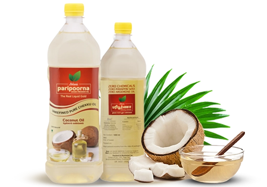 Two bottles of coconut oil paired with a coconut and green leaves, bringing nature's essence to you.