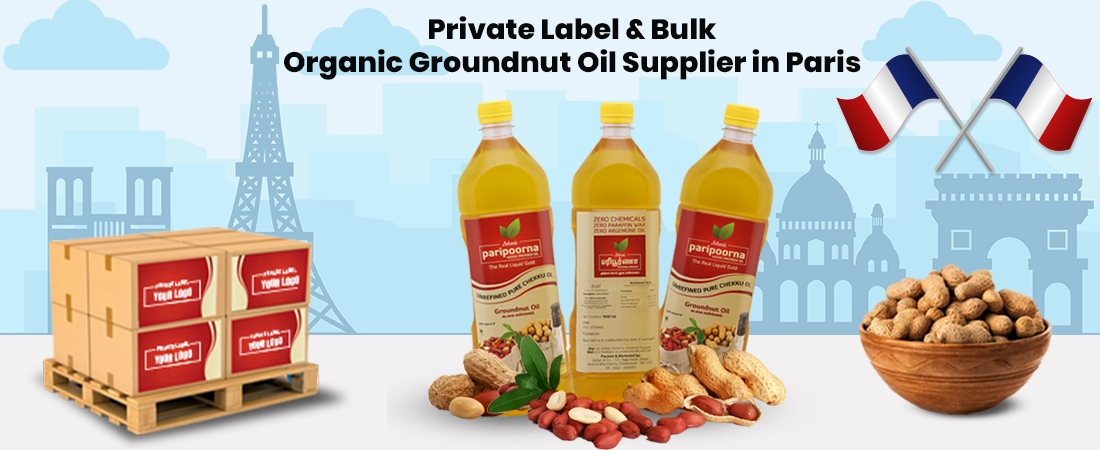 Bulk organic groundnut oil bottles with a shipping pallet and Paris city skyline background.